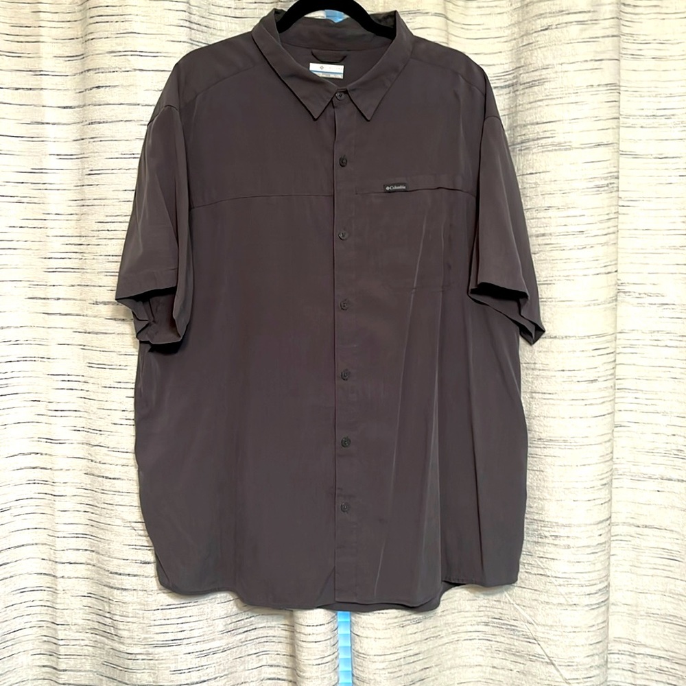 A Columbia button-up shirt is versatile and can be dressed up or down.